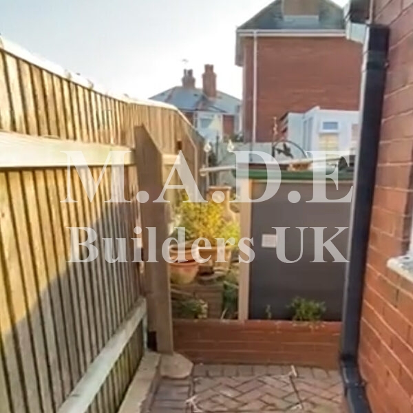 Outside toilet and dining room converted into disabled ground floor bedroom and en suite wet room
