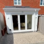 Timber frame extension with bi fold doors   after