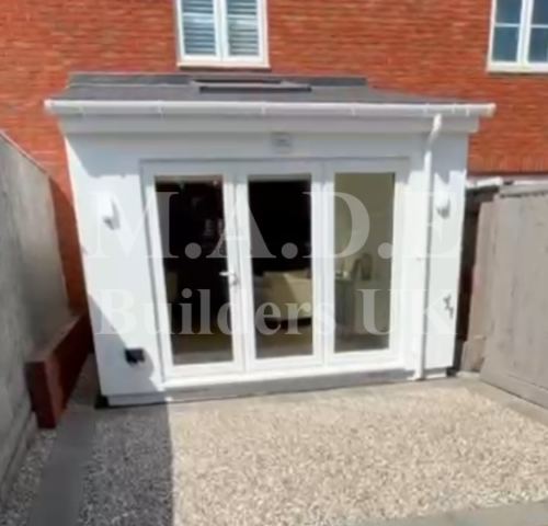 Timber frame extension with bi-fold doors - after Timber frame extension with bi-fold doors - after