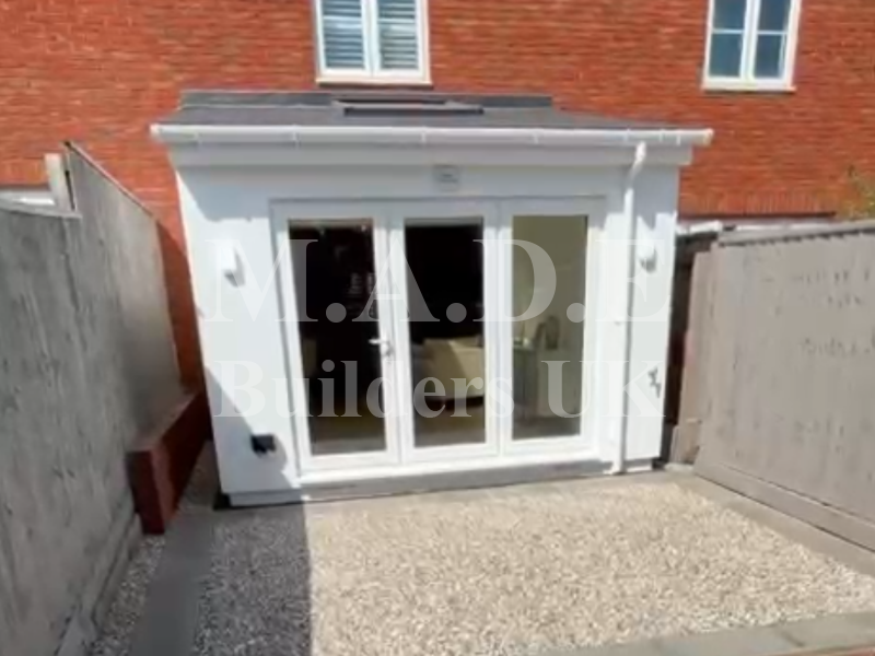 Timber frame extension with bi fold doors   after