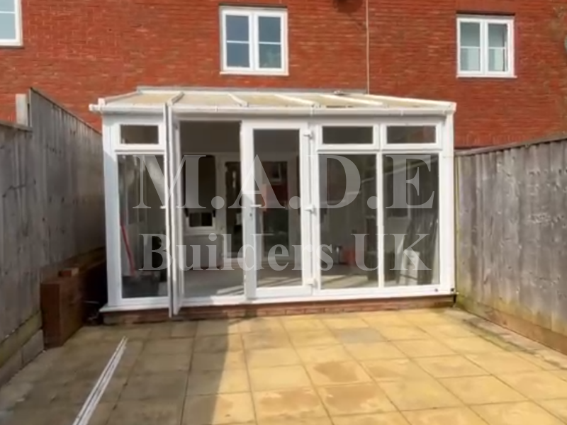 Timber frame extension with bi fold doors   before